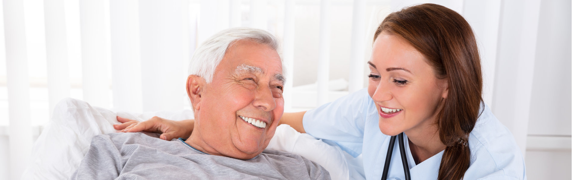 nurse and senior smiling